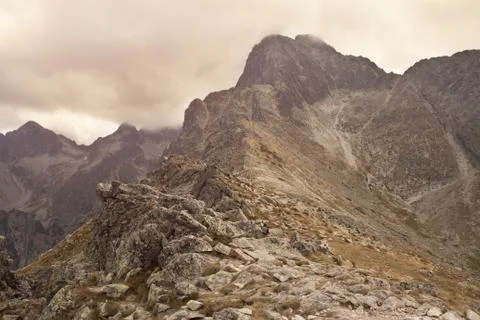 Mountains range with cloudy sky Stock Photos