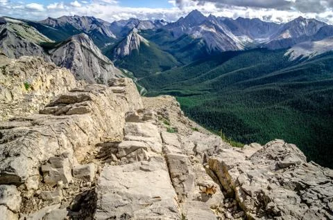 Mountains range view in Jasper NP with chipmunk in foreground Stock Photos