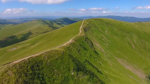 Mountains ranges in beautiful summer day. Aerial view Stock Footage 79063628