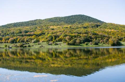 Mountains reflected in the lake Stock Photos