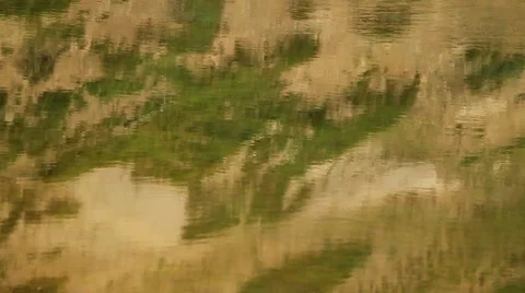 Mountains reflected in water two Stock Footage 7753076