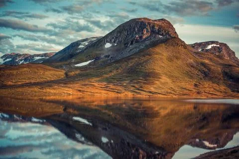 Mountains with reflection Stock Photos