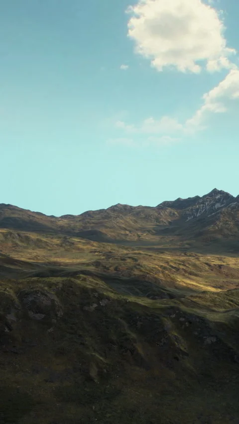 Mountains rise under a blue sky with clouds on a clear day Stock Footage 340282851