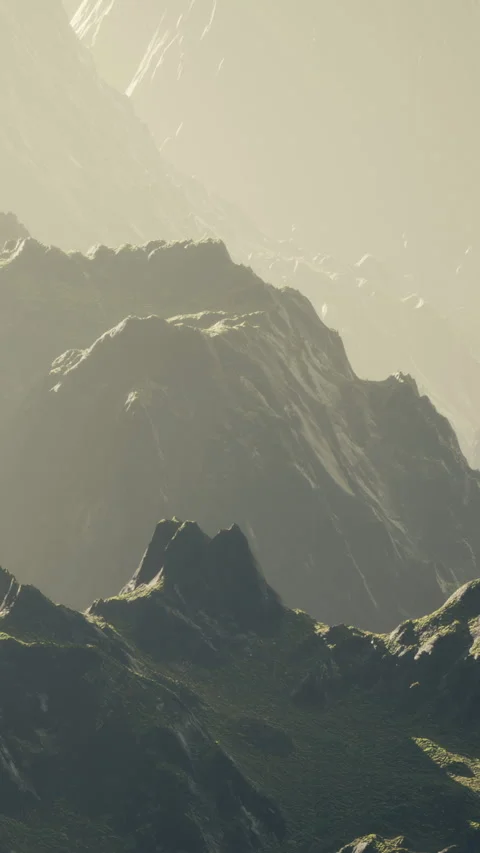 Mountains rise under soft light in a remote area during the day Stock Footage 334197905