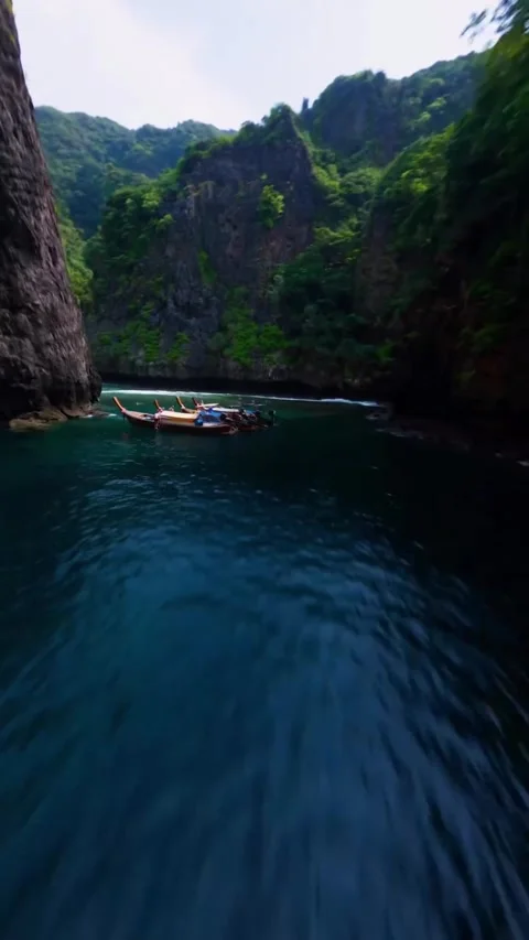 Mountains in the river with boats Stock Footage 272297474