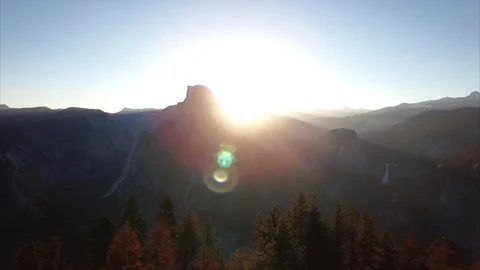 Mountains, road and the sun, Half Dome yosemite. Aerial view Stock Footage 72160728