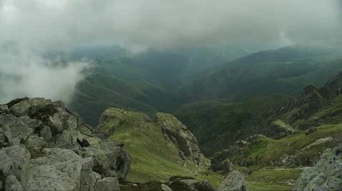 Mountains Rocks and Mist Timelapse 4K Stock Footage 64209889