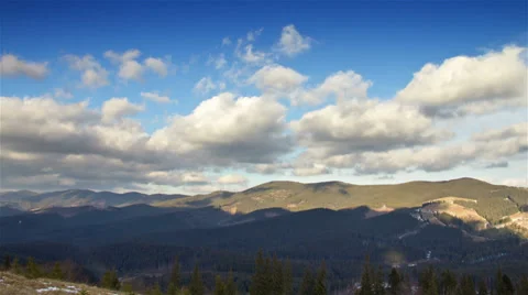 Mountains with running clouds time lapse Stock Footage 33852428