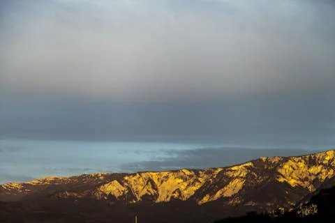 Mountains by the sea Stock Photos