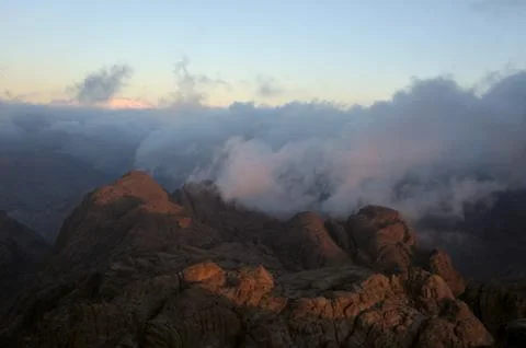 Mountains, shrouded in clouds Stock Photos