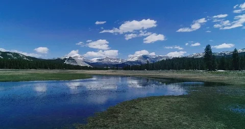 Mountains, sky reflection in Yosemite, 4K Stock Footage 94706569