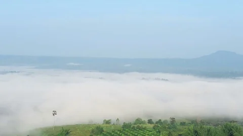 Mountains, sky, trees and mist in the morning. 4K Timelapse Stock Footage 81541357