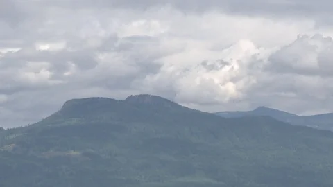 Mountains with slow moving clouds Stock Footage 75210574