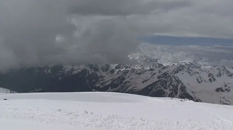 Mountains, snow and clouds Stock Footage 39537940