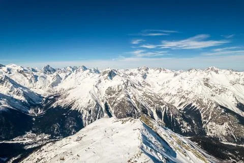 Mountains in snow clouds and sky Stock Photos