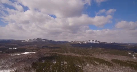 Mountains. Snow-covered forest at the foot of the mountain. Stock Footage 89731205