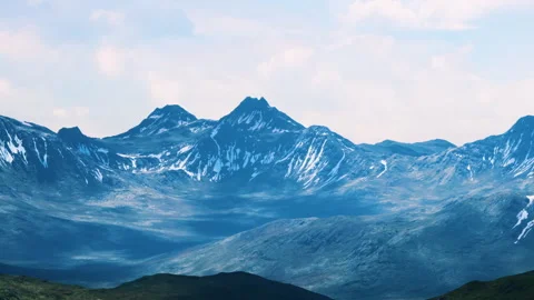 Mountains with snow patches under a cloudy sky in a remote location Stock Footage 340226444
