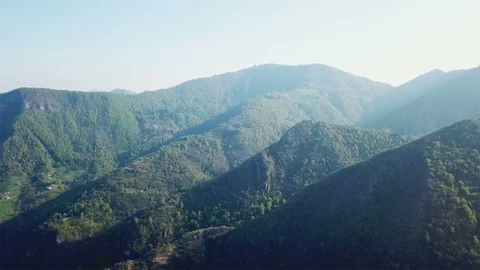 Mountains spring landscape aerial view on sunrise - shot from 4k drone Stock Footage 88986464