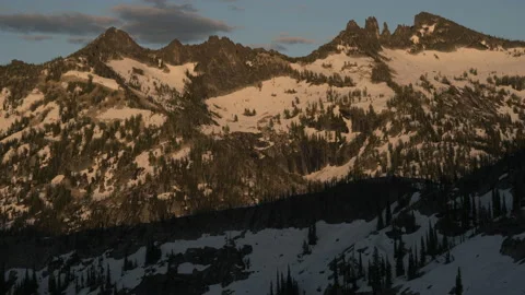 Mountains in spring with melting snow pack sunset shadow Stock Footage 167122620