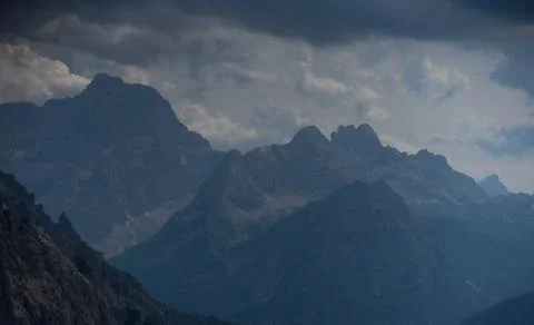 Mountains static, in cloudy sky, with mountain peaks, clouds, from a distan.. Stock Photos