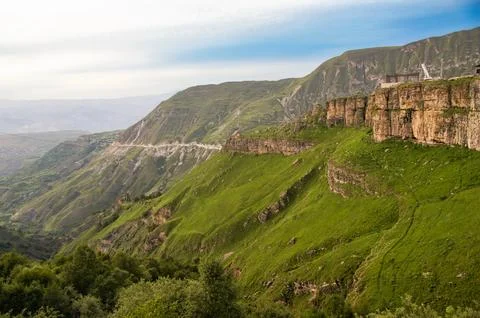 Mountains with steep green slopes. Photos