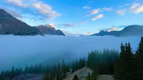 Mountains At Sunrise Above The Clouds Video stock 220464737