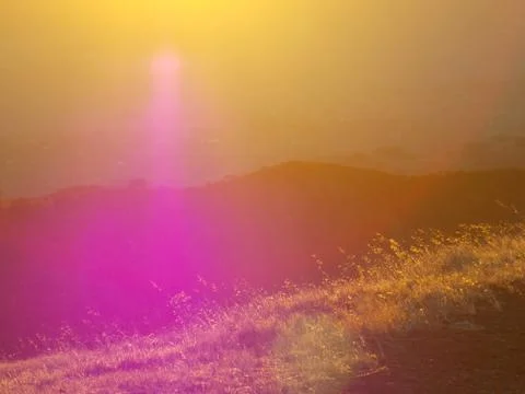 Mountain's sunset grass Stock Photos