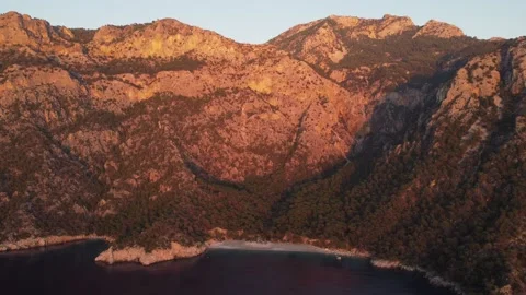 Mountains at sunset on the seashore Stock Footage 231998400