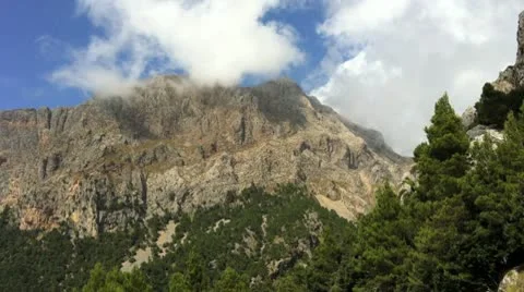 Mountains surrounded by clouds Stock Footage 9272020