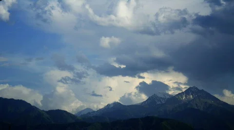 Mountains with time lapse clouds Stock Footage 563391
