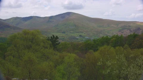 Mountains with trees in foreground Vidéo 75589713