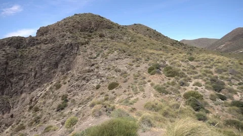 Mountains under the blue sky in the desert of almeria Stock Footage 90910268