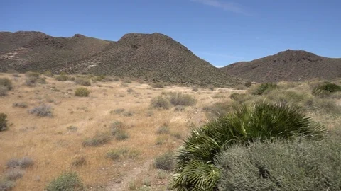 Mountains under the blue sky in the desert of almeria Stock-Footage 90932181