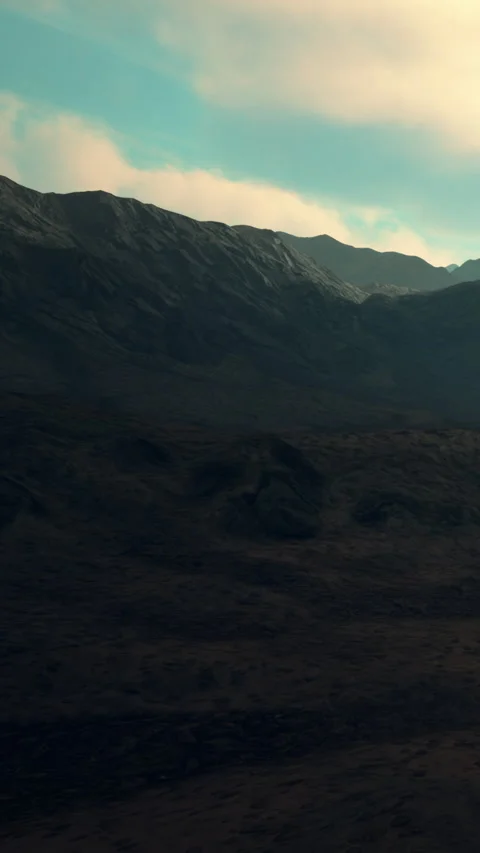 Mountains under cloudy sky with distant peaks and rugged terrain Stock Footage 346758932