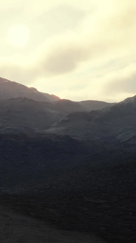 Mountains under cloudy sky during early morning light Stock Footage 346758848
