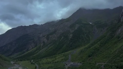 Mountains under Cloudy Sky Stock Footage 318467904