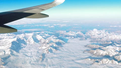 Mountains view from airplane window Stock Footage 296916145
