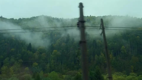 Mountains view outside train window. Passenger train compartment passing by Stock Footage 264027257