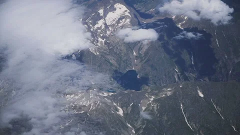 The mountains. View of the plane on the mountains Stock Footage 100081072