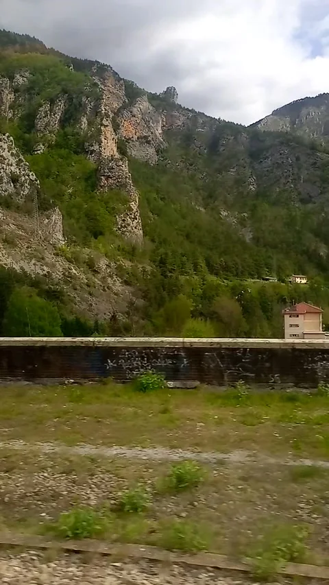 Mountains view from the train window Stock Footage 309011475