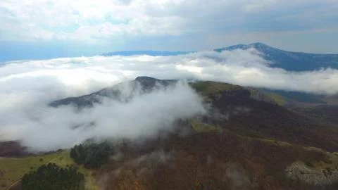 Mountains in white clouds Stock-Fotos