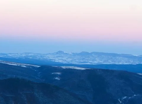 Mountains winter sunset Stock Photos