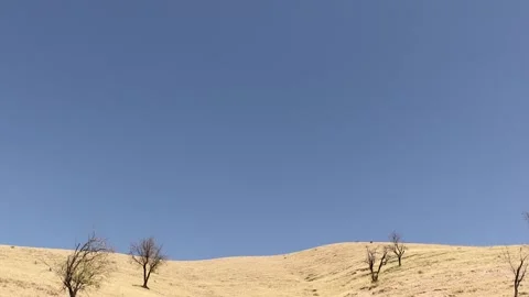 Mountains with yellow grass Stock Footage 249444965