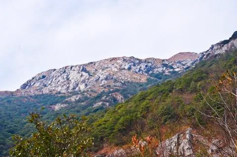 Mountainside of the high peak Stock Photos