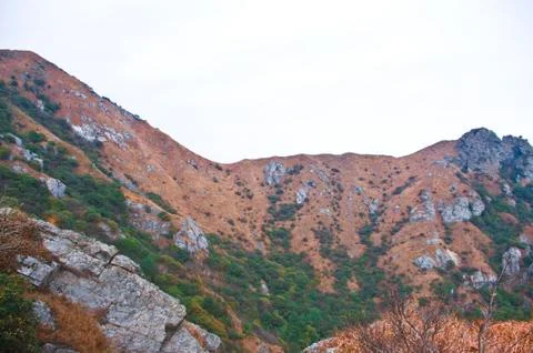 Mountainside of the high peak Stock Photos