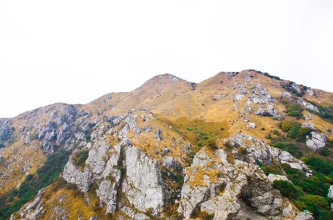 Mountainside of the high peak Stock Photos