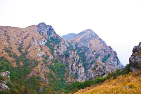 Mountainside of the high peak Stock Photos