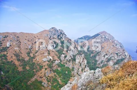 Mountainside of the high peak Stock Photos