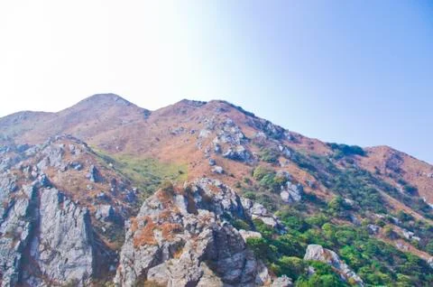 Mountainside of the high peak Stock Photos