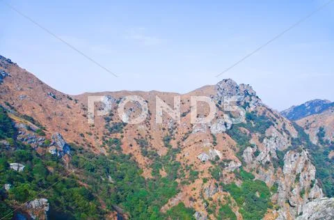 Mountainside of the high peak Stock Photos